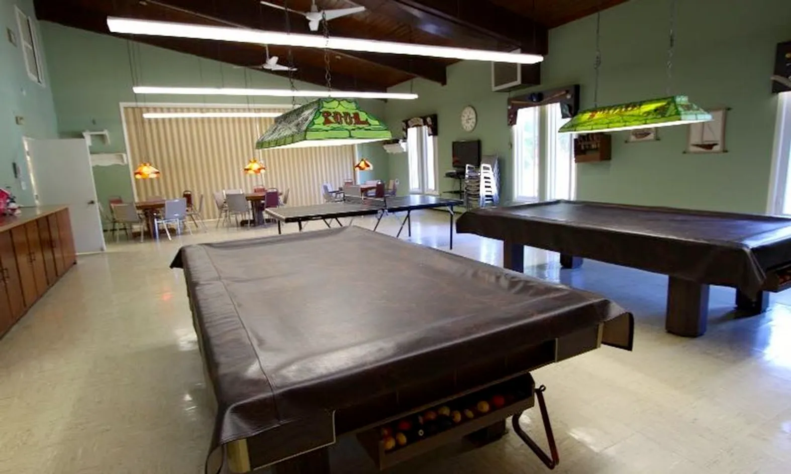 Indoor billiards and pool table game room in the clubhouse